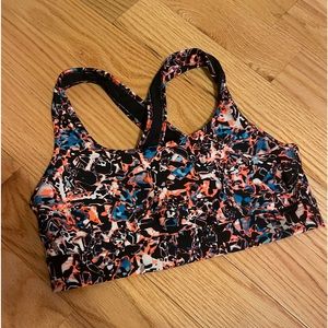 Size medium mixture of colors under armor, sports bra